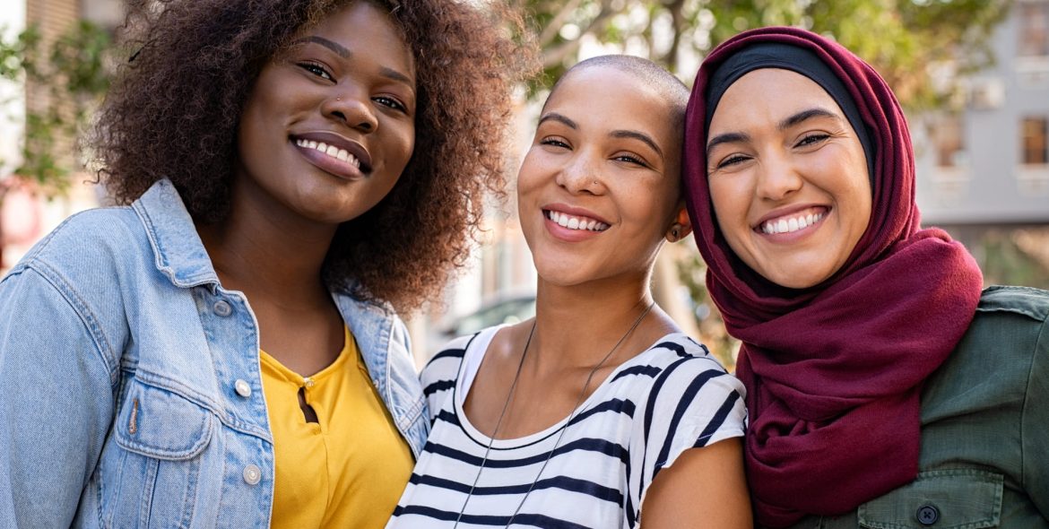 multiethnic-young-friends-enjoying-together-NETQW98.jpg